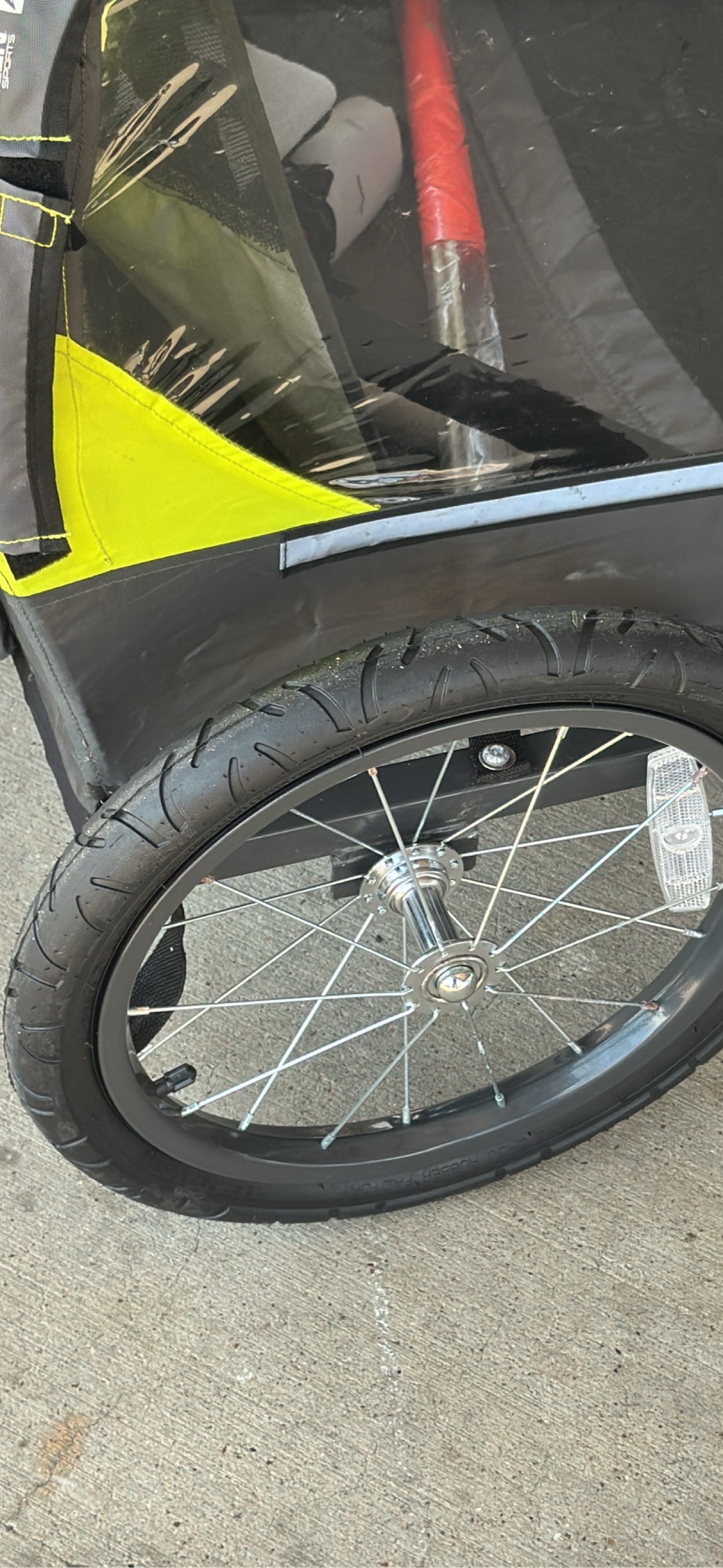 Close-up of the Allen Sports trailer wheel and side panel