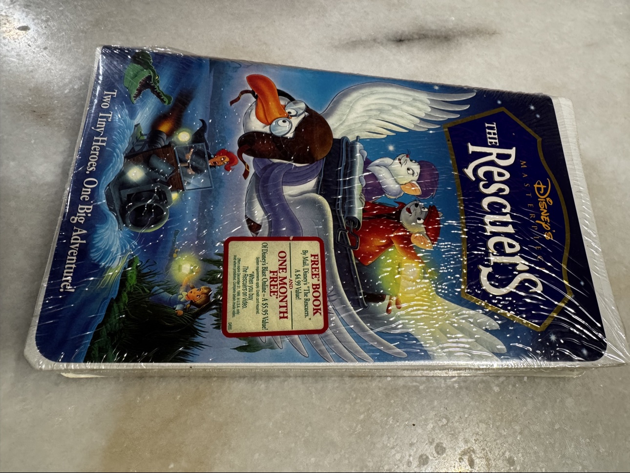 Front view of sealed The Rescuers VHS