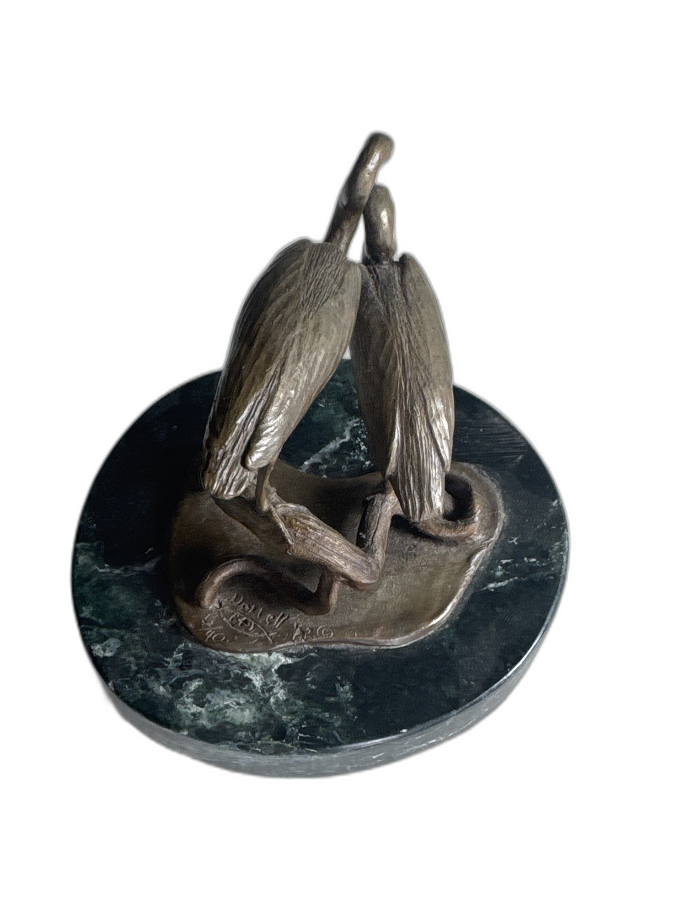 Top view of the bronze heron pair sculpture