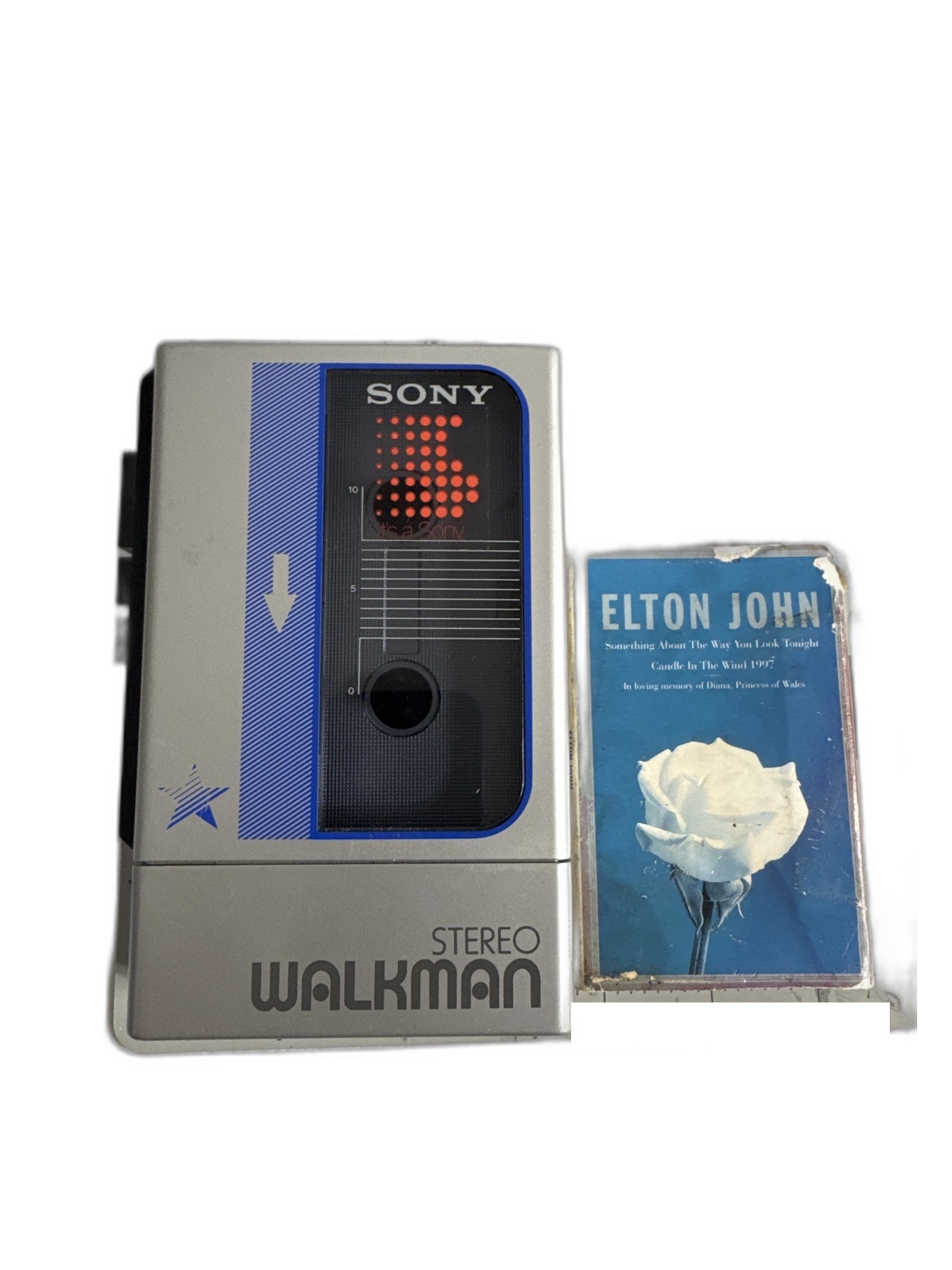 Sony WM-8 Walkman with the included Elton John cassette single