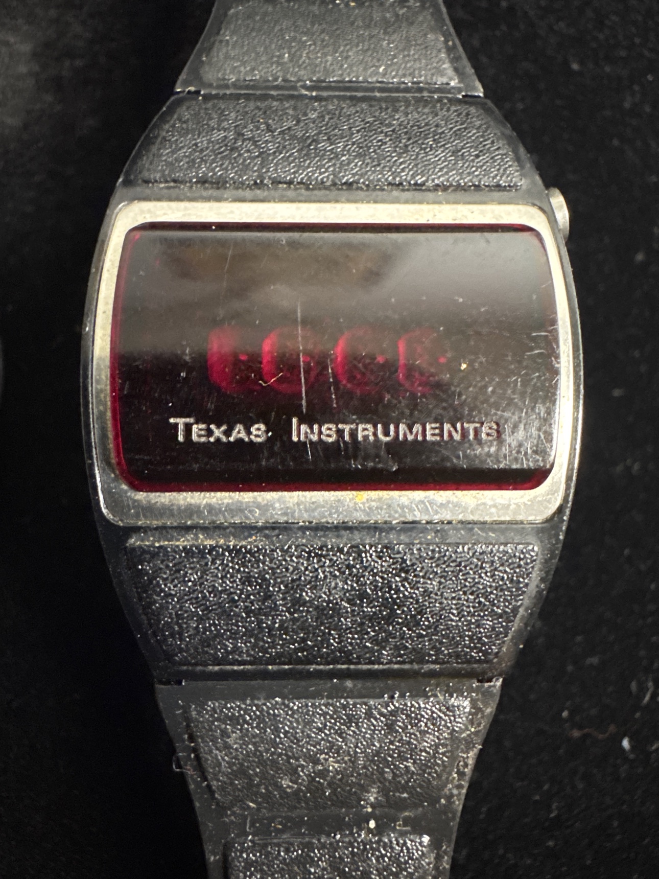 Close-up of the rectangular-case Texas Instruments red LED digital watch